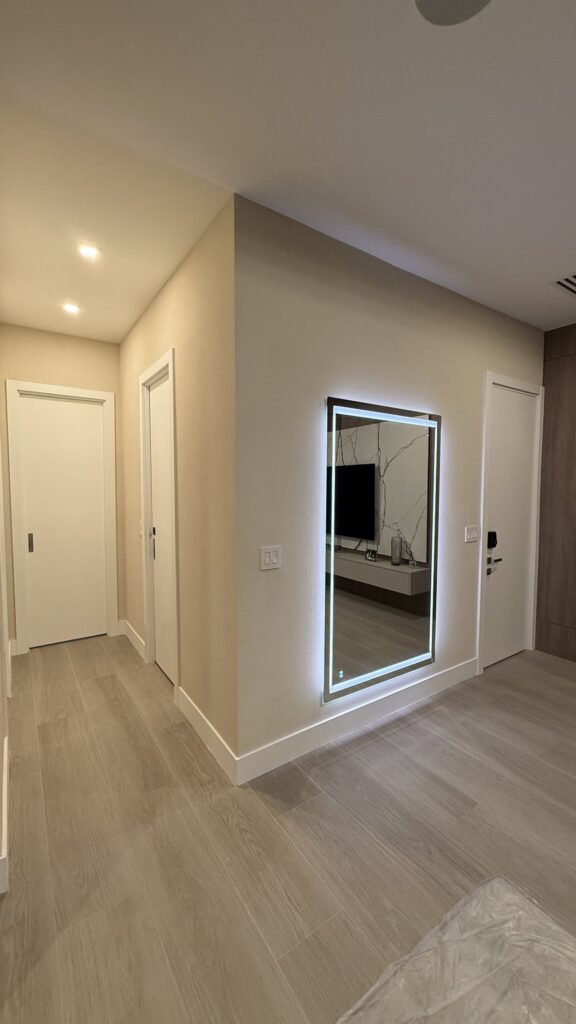 Hallway with wallcovering in a Miami residence by Salt Wallcovering