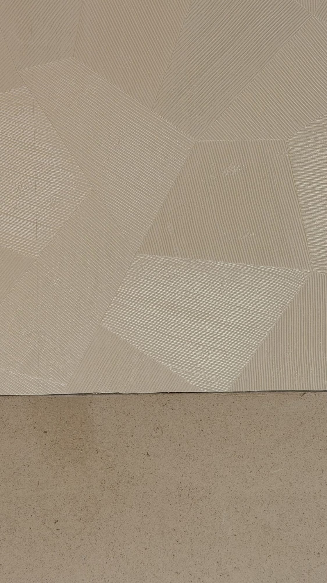Textured wallcovering installation in a fashion boutique by Salt Wallcovering