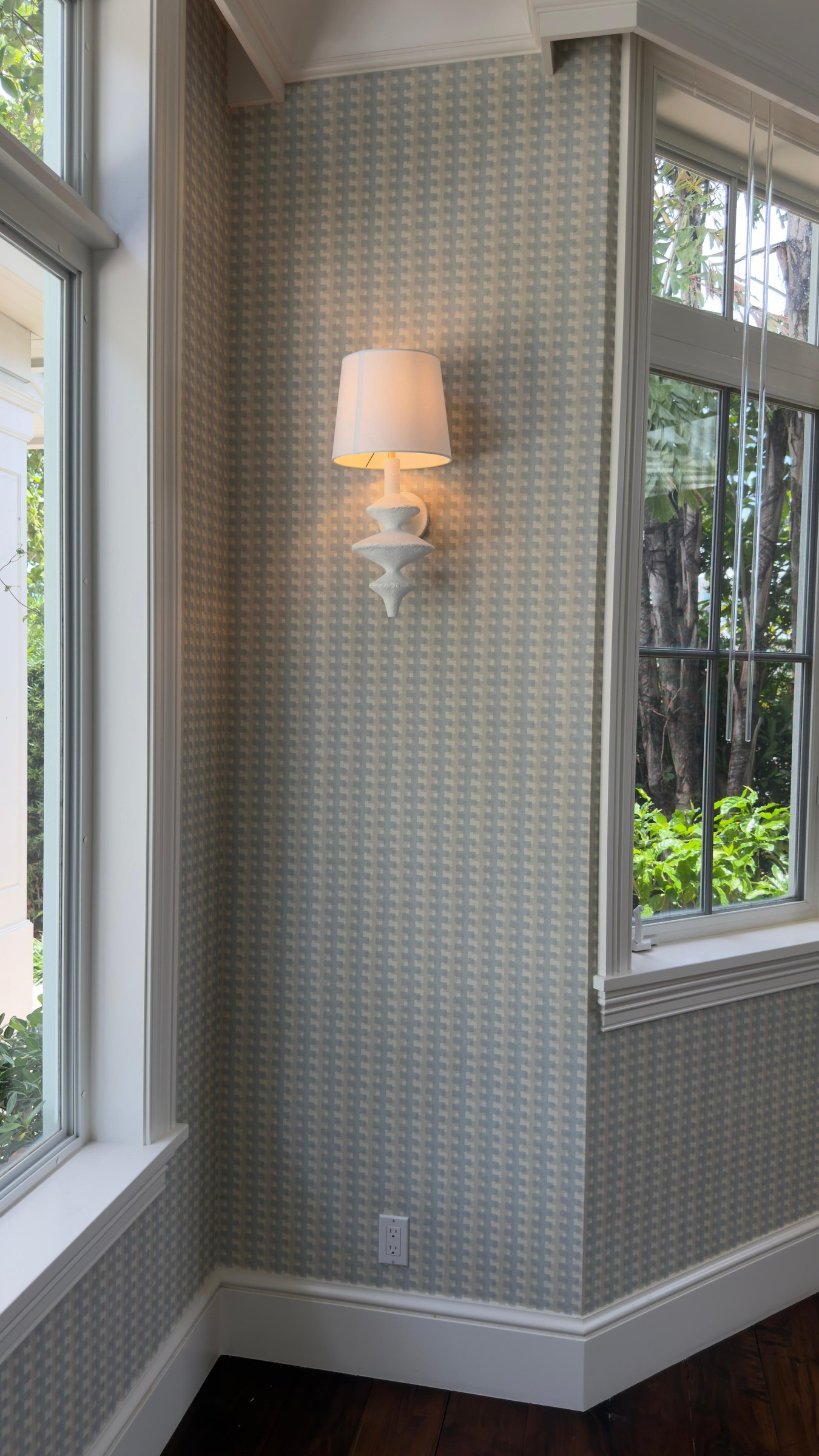 Sunroom with textured geometric wallcovering in a private residence in Fort Lauderdale by Salt Wallcovering